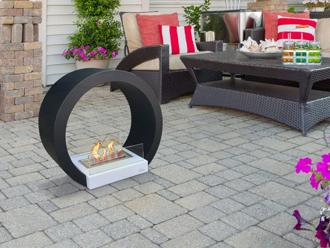 Biochimenea de suelo -  Modelo MOREA B | 2000W | Diseño semicircular | Acero color negro | Cristal templado