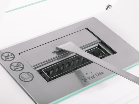 SATURN W: Chimenea de etanol de suelo en acero blanco y llama regulable