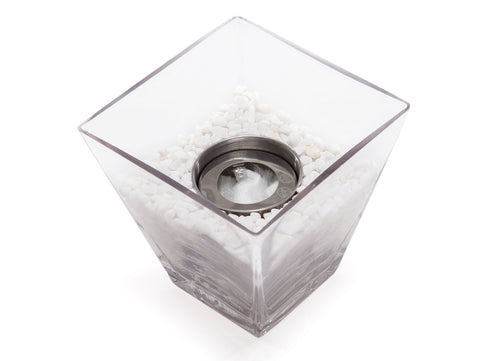 Chimenea de etanol de sobremesa  en cristal templado y con piedras decorativas blancas