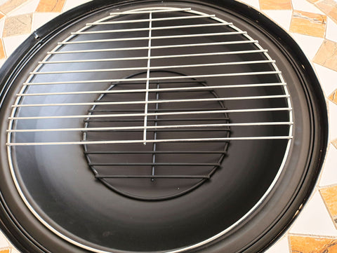 Brasero exterior circular en cerámica y mármol con parrilla